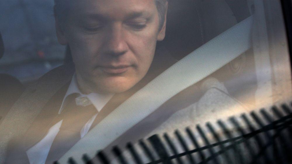 FILE - In this Jan. 11, 2011 file photo, WikiLeaks founder Julian Assange arrives at Belmarsh Magistrate's court in London for an extradition hearing. According to a cache of internal WikiLeaks files obtained by The Associated Press, Assange sought a Russian visa and staffers at his radical transparency group discussed having him skip bail and escape Britain as authorities closed in on him in late 2010. (AP Photo/Sang Tan)